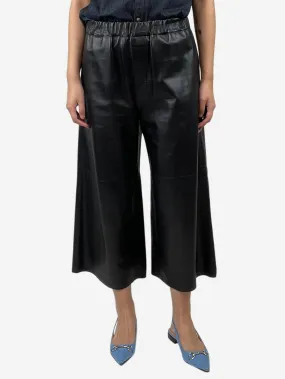 Black wide-leg cropped leather trousers - size M